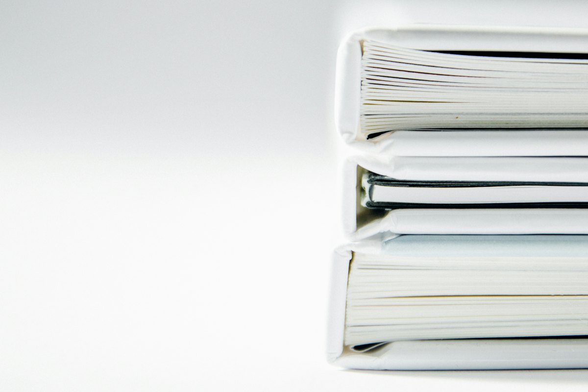 A stack of document binders