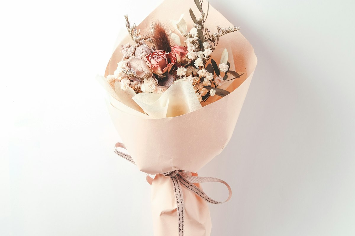 A wrapped bouquet ready to be delivered