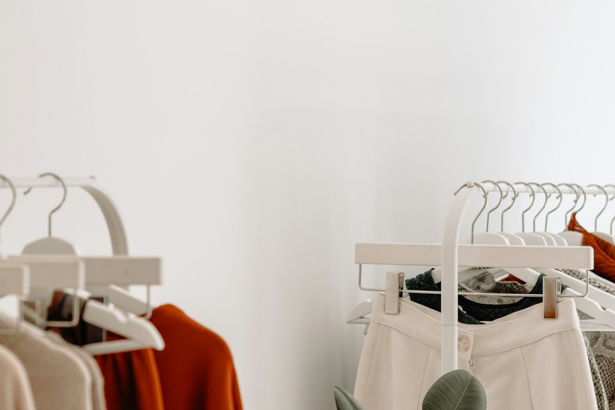 Garments hanging on a shop rail